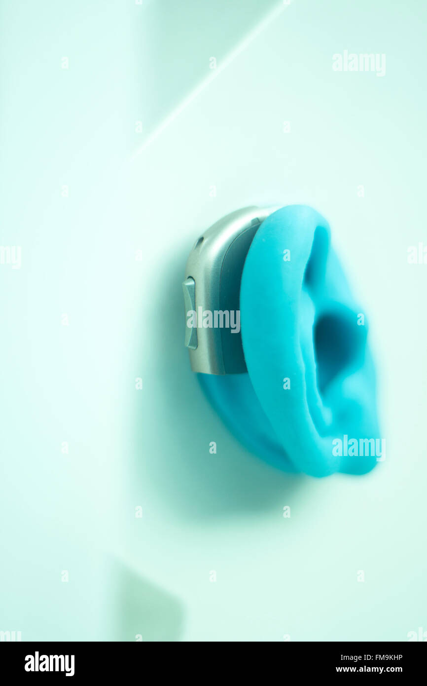 Hearing aid on prosthetic ear in store shop window display Stock Photo Alamy