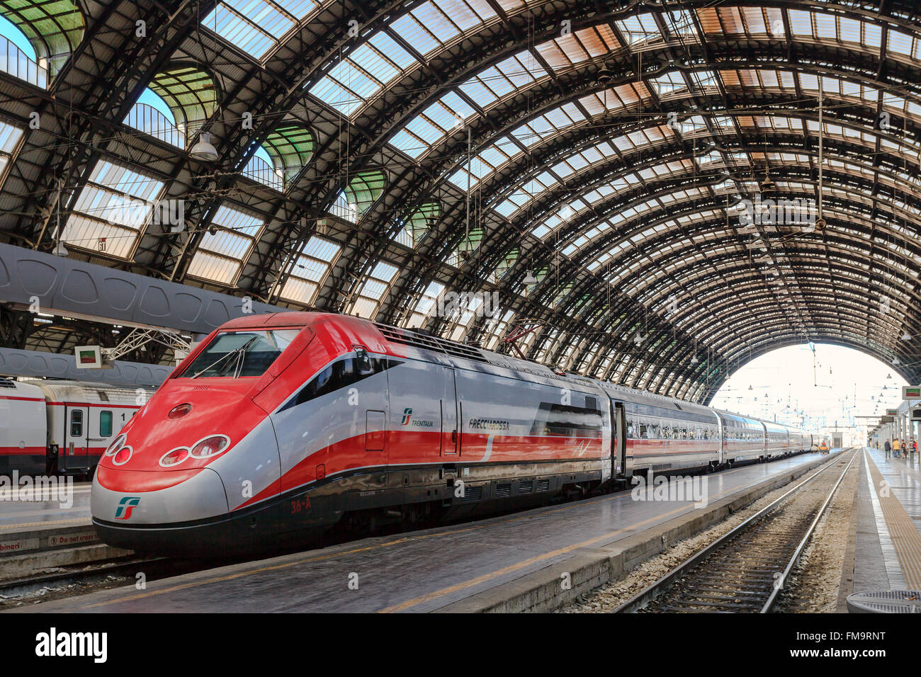 Milan, Italy - August 26, 2013: high speed train Red Arrow, stopped on a  track to Milan Central Station Stock Photo - Alamy
