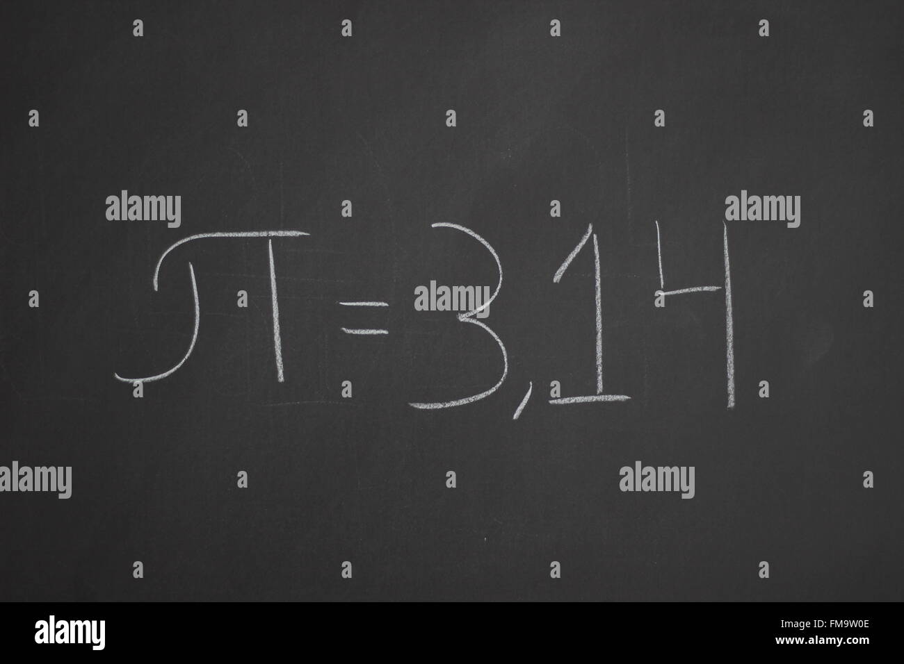 Studying the science of mathematics and economics on a blackboard Stock Photo