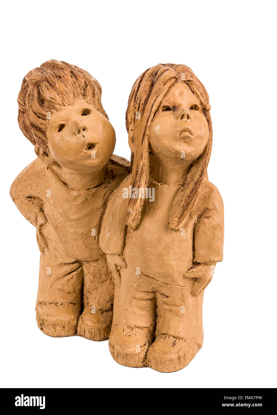 Lee Bortin clay sculpture of two young children looking up isolated on white background  Model Release: No.  Property Release: No. Stock Photo
