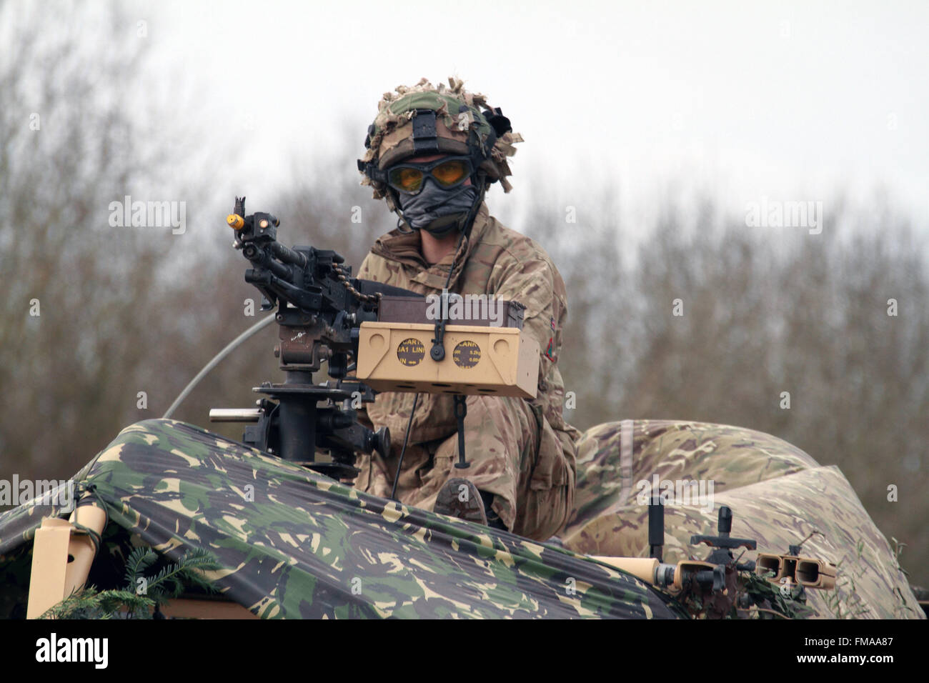 Jackal Patrol vehicle gunner manning weapons station. Stock Photo