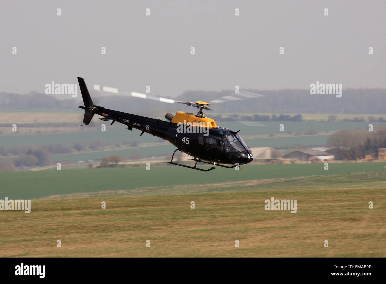 Army Air Corps Squirrel HT2 helicopter Middle Wallop AAC training flight Salisbury Plain Training Area SPTA helicopter military aviation rotary flight flying pilot training military test testing exercise skills instruction Stock Photo