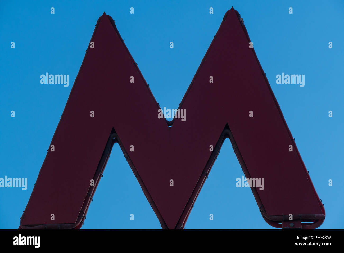 Letter M - the symbol of the Moscow Metro on blue sky background Stock ...