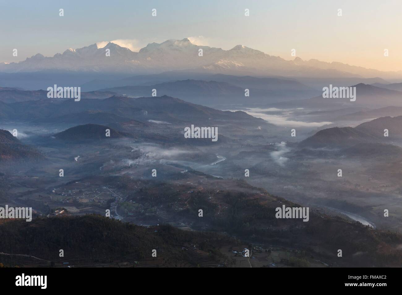 Nepal, Gandaki zone, Bandipur, Himalaya mountains and mist in the valley at sunrise Stock Photo