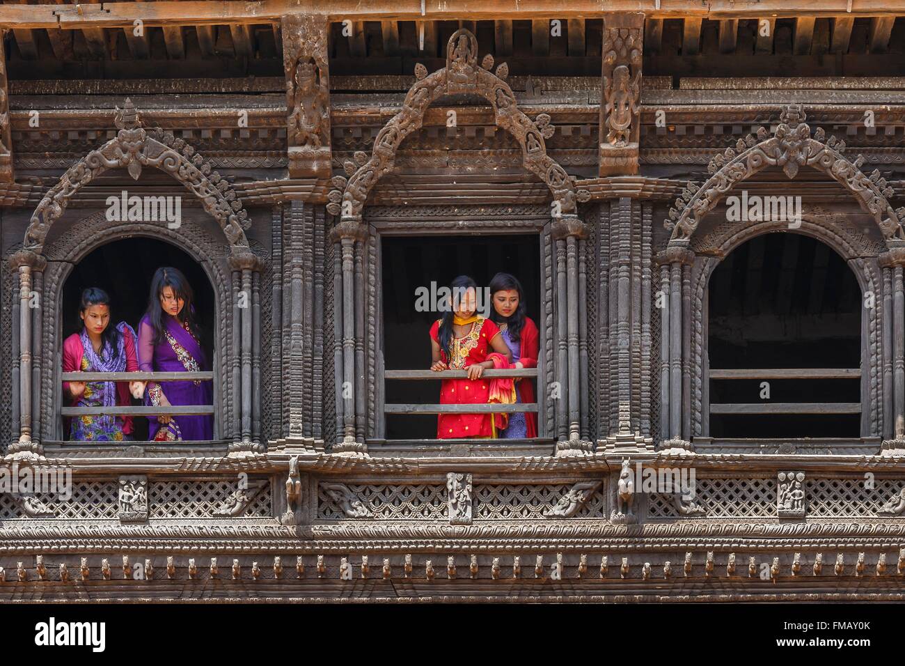Nepal, Bagmati zone, Nuwakot, women at Sat Tale Durbar (seven storey palace) window Stock Photo