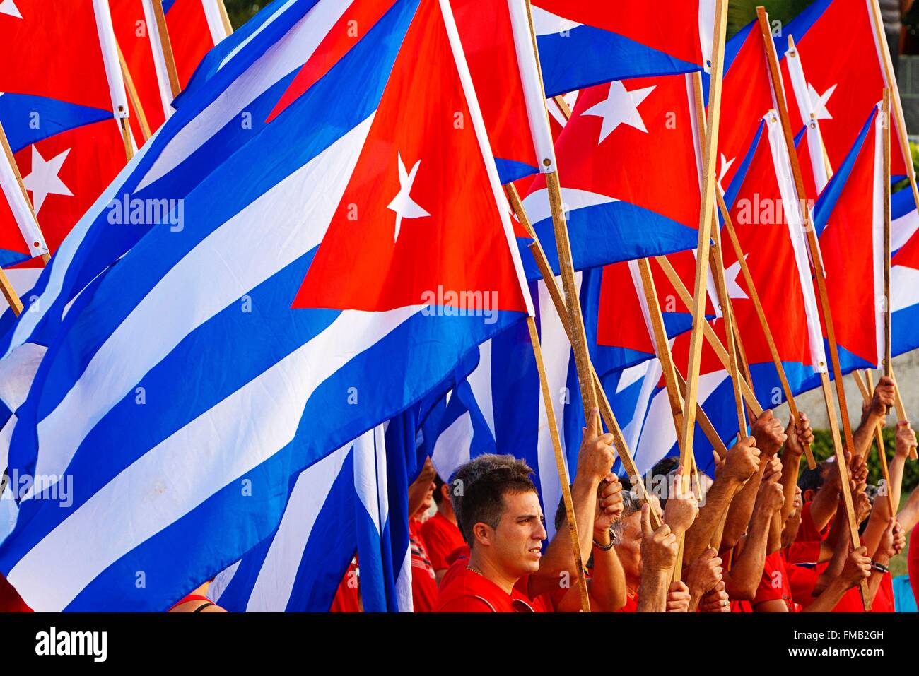 Cuba, Villa Clara, Santa Clara, Many Cuban flags waved by supporters Stock Photo