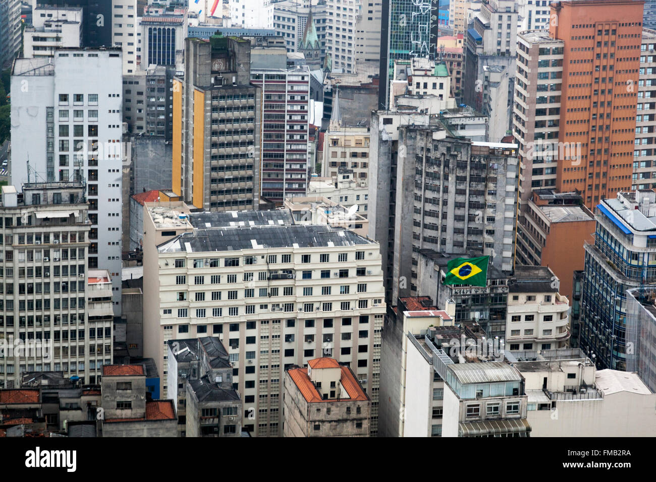 Brazilian flag in a sea of block buildings, Sao Paulo, Brazil Stock Photo