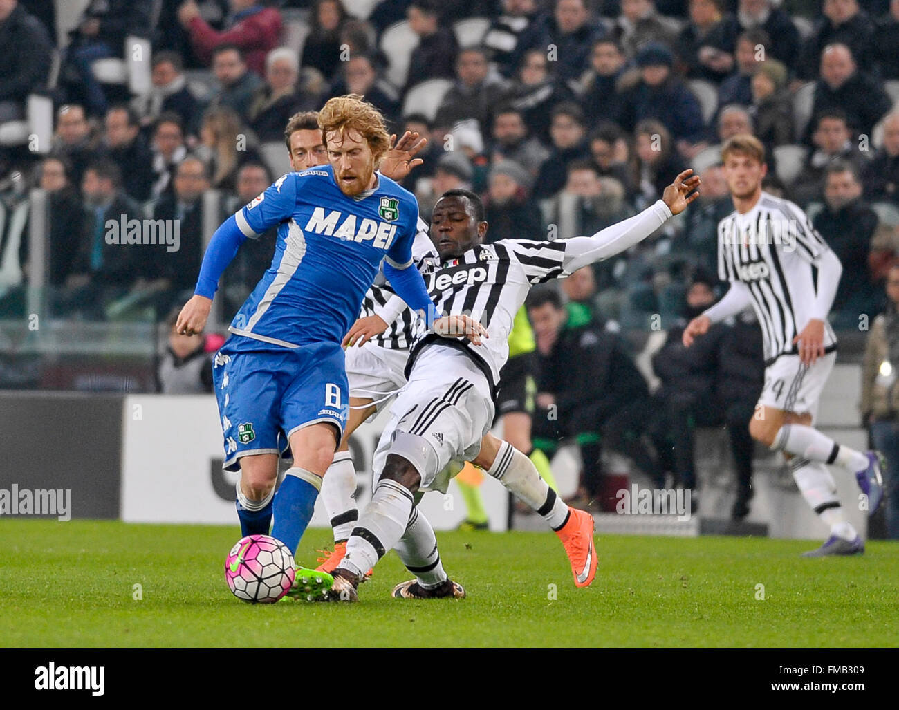 Turin, Italy. 11th March, 2016: Davide Biondini (left) and Kwadwo Asamoah during the Serie A football match between Juventus FC and US Sassuolo Calcio at Juventus Stadium in Turin, Italy. Credit:  Nicolò Campo/Alamy Live News Stock Photo