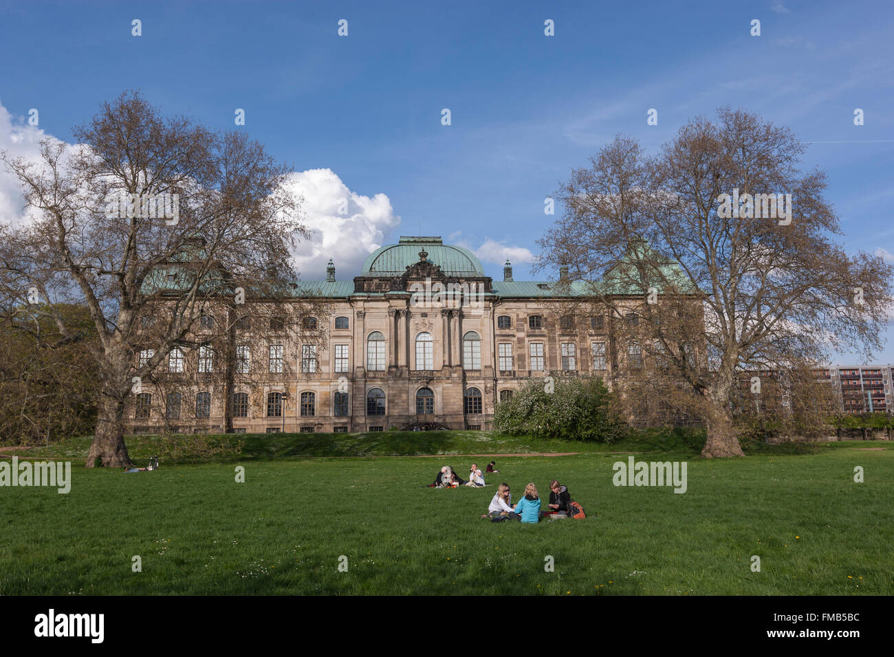 People in the grass in front of Japanisches Palais, Dresden, Saxony, Germany Stock Photo