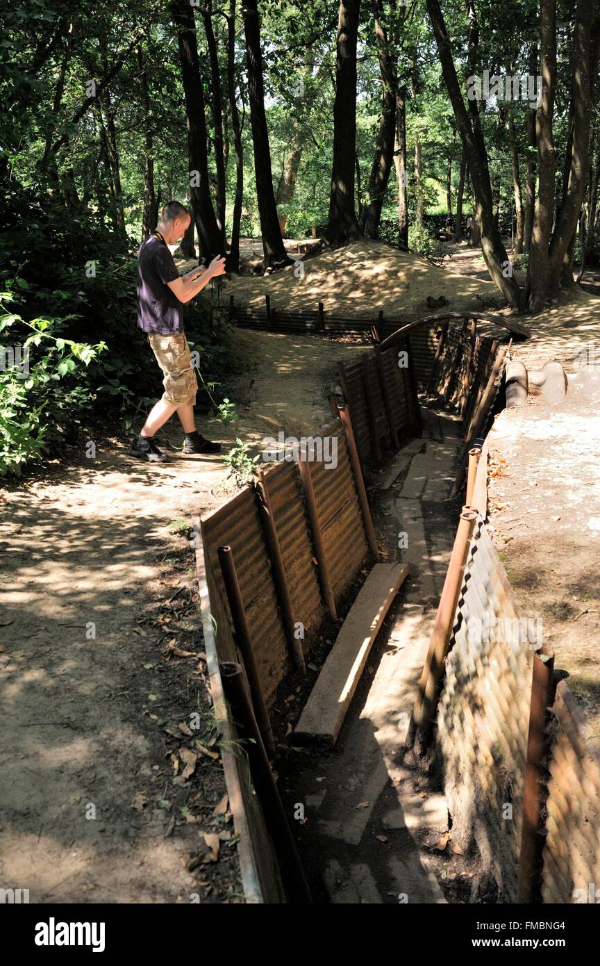 Belgium, West Flanders, Ypres or Ieper, Sanctuary Wood Museum Hill 62, young man photographing a trench Stock Photo