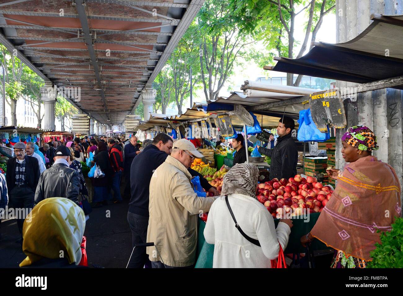 France, Paris, boulevard de la Chapelle, Barbes market under the elevated  metro Barbes-Rochechouart Stock Photo - Alamy
