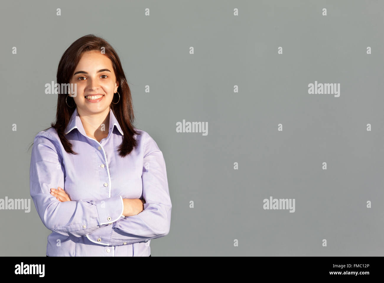 Portrait of a beautiful business woman smiling Stock Photo - Alamy