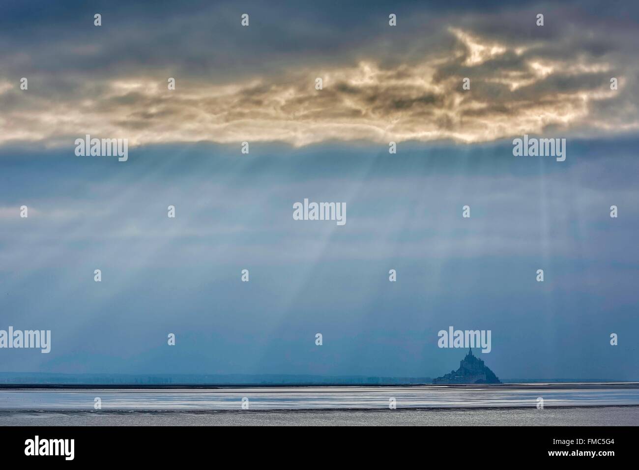 France, Manche, Mont Saint Michel, listed as World Heritage by UNESCO, Lights on the bay with the Mount at the bottom Stock Photo