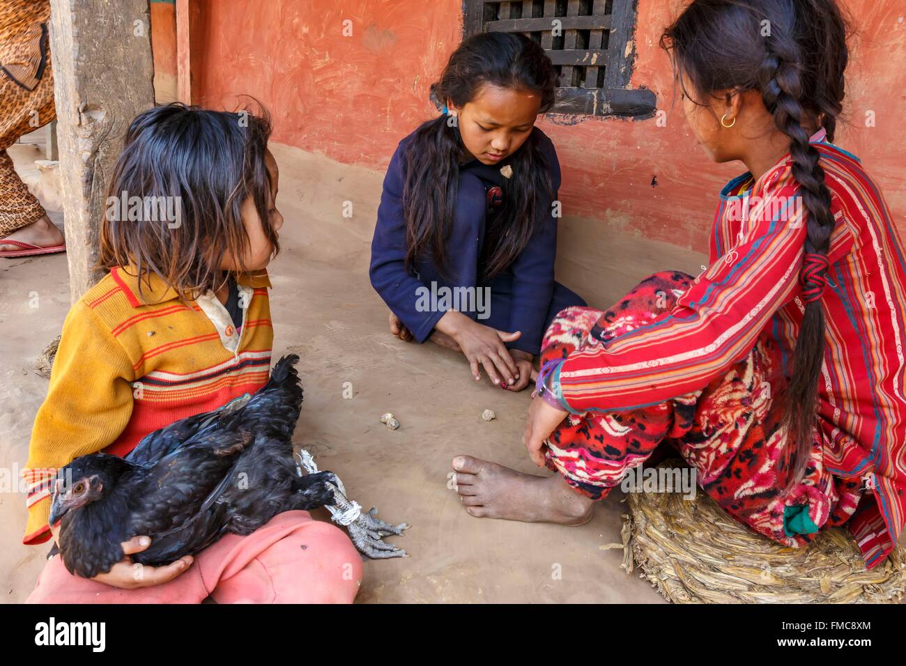 Nepal, Gandaki zone, Ramkot, girls playing jacks with stones Stock Photo
