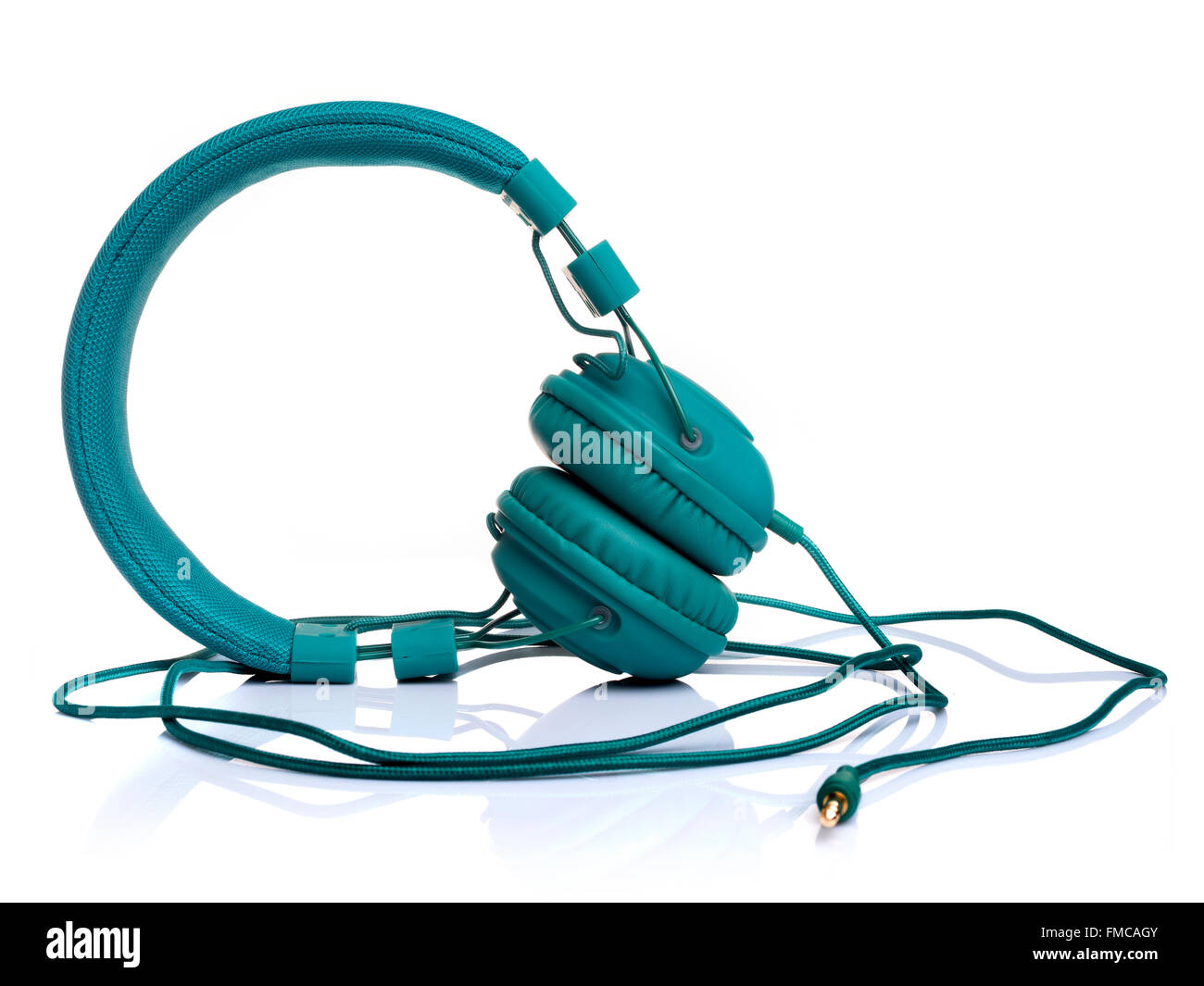 Green headphones isolated on white background Stock Photo Alamy