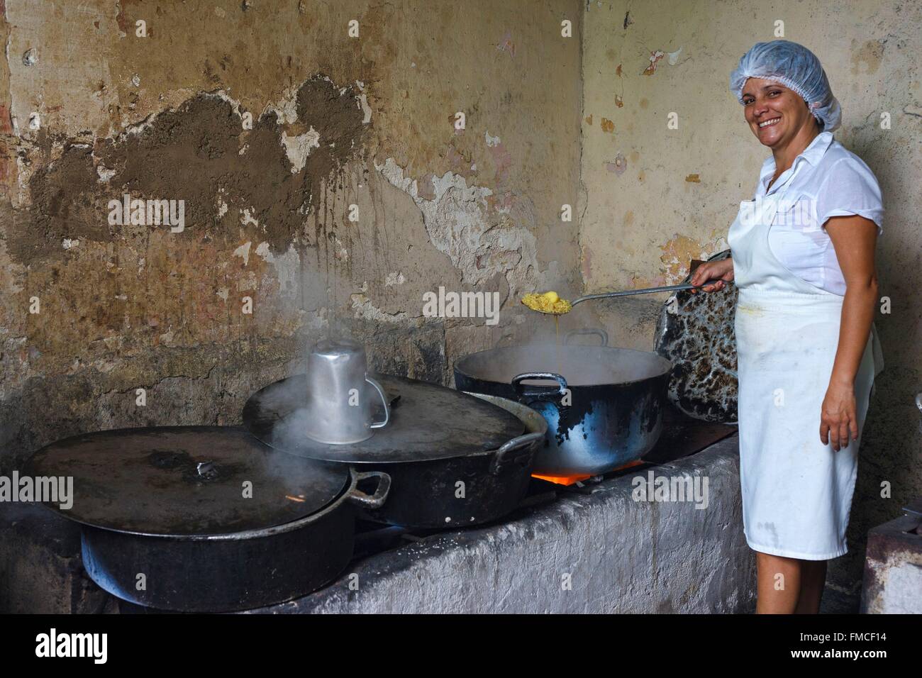 Cuba, Villa Clara, Caibarien, Staff bustling in the kitchen of a restaurant Stock Photo