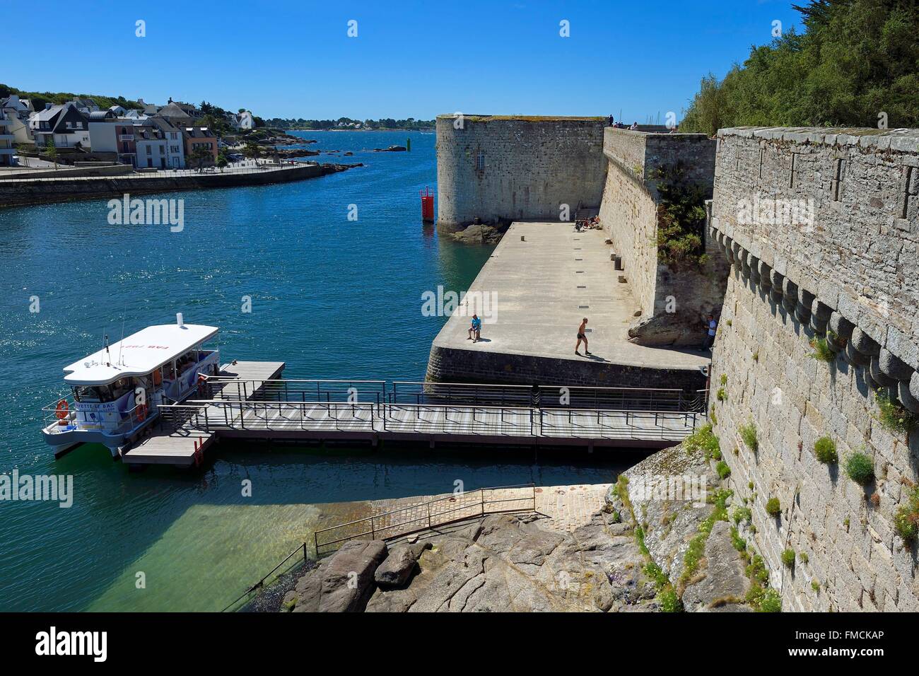 France, Finistere, Concarneau, , Ville Close (walled town), the electric ferry and the ramparts Stock Photo