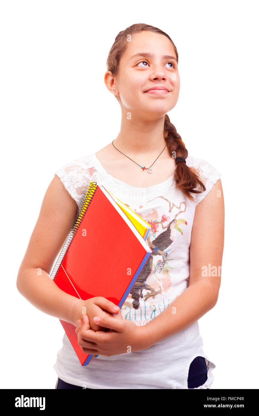 Smiling school girl holding notebooks on white background Stock Photo ...