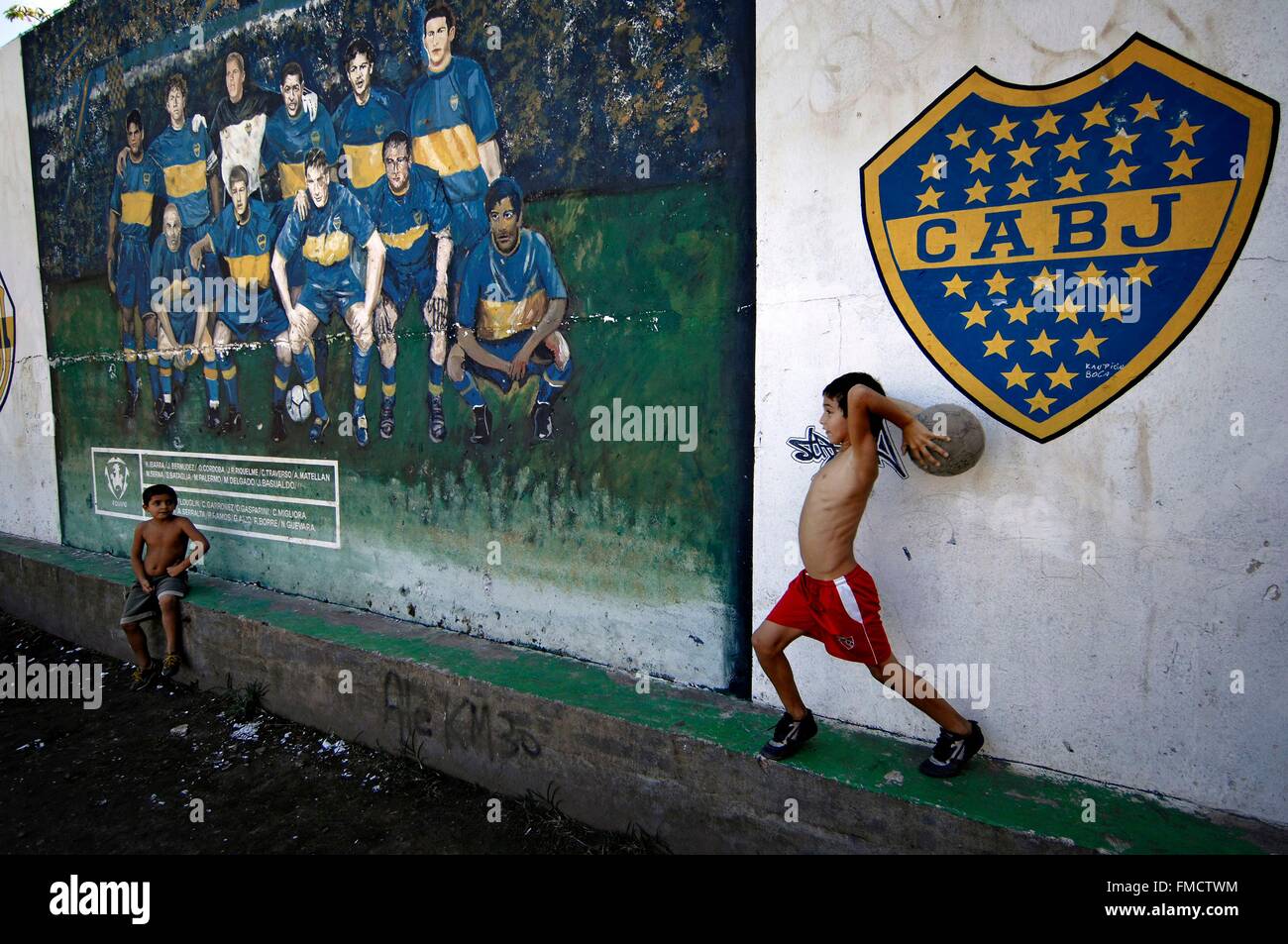 Argentina, Buenos Aires province, Buenos Aires, local kids play football in  the La Boca neighborhood, La Boca is a Stock Photo - Alamy