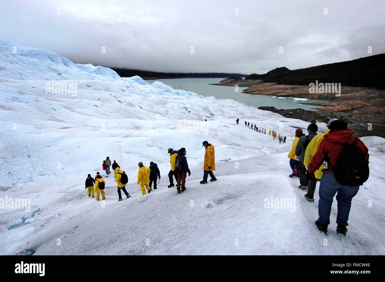 Argentina, Patagonia, Santa Cruz province, Parque Nacional Los Glaciares, Perito Moreno glacier, expedition of tourists on the Stock Photo
