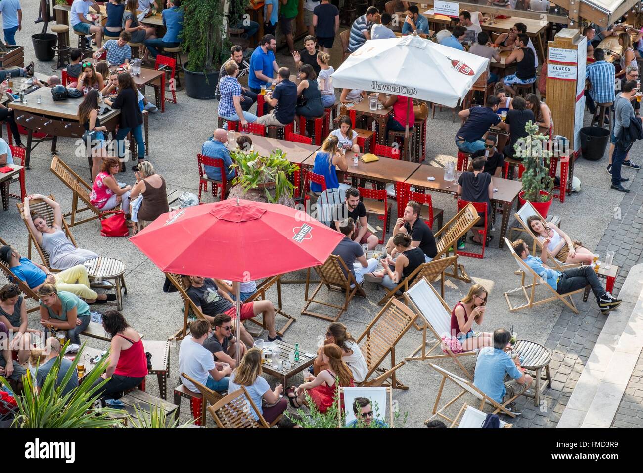 France, Paris, Quai François Mauriac, in summer ephemeral restaurants settled along the Seine Stock Photo