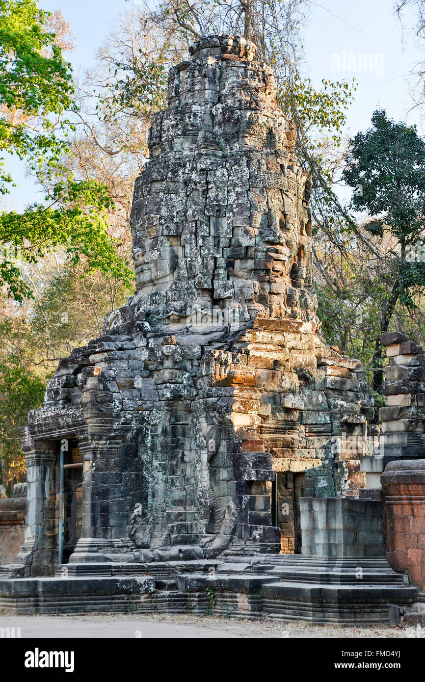 Face tower and entryway, Ta Prohm Temple, Angkor Archaeological Park, Siem Reap, Cambodia Stock Photo