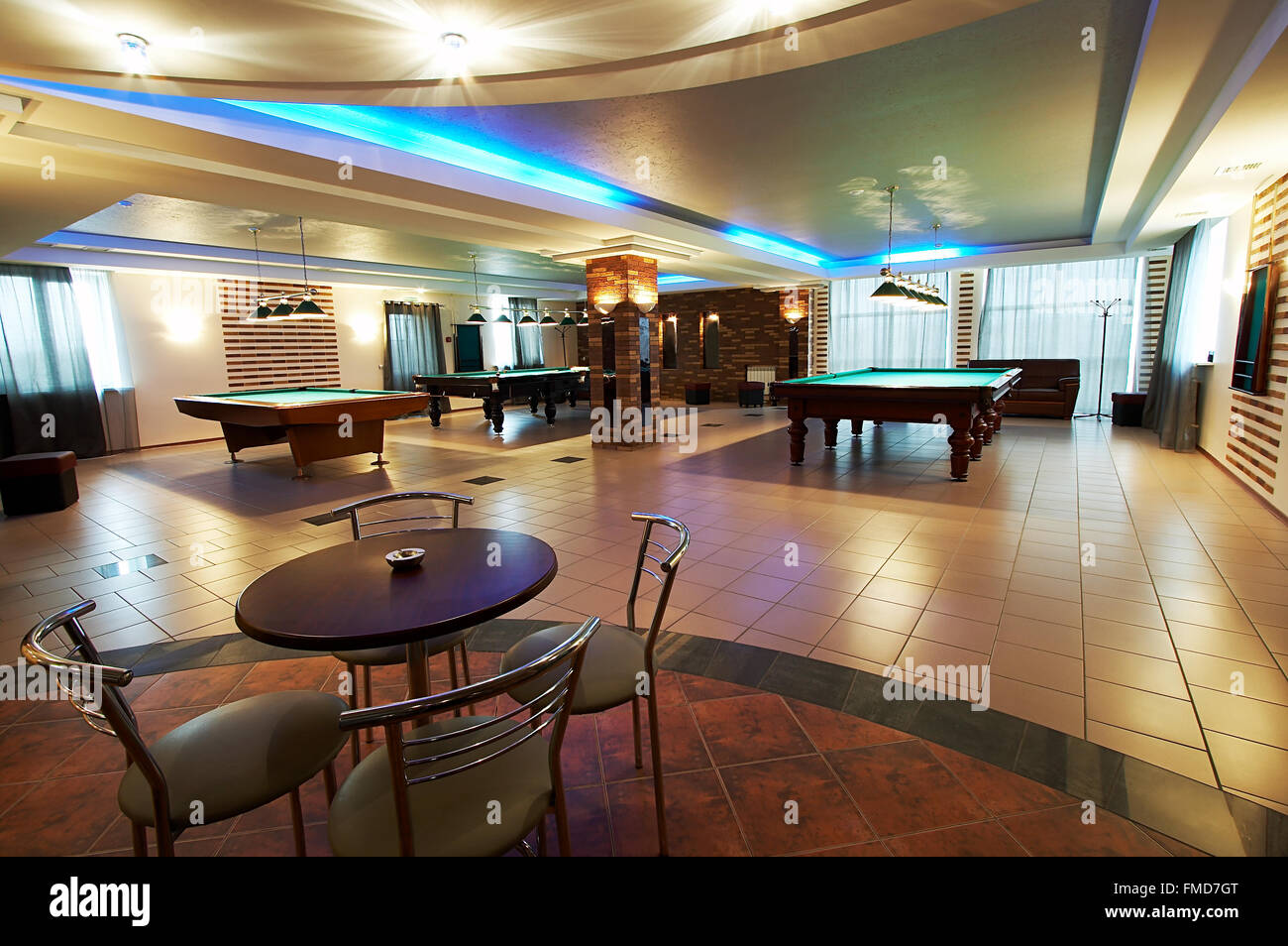 Billiard room and cafe in modern hotel Stock Photo - Alamy