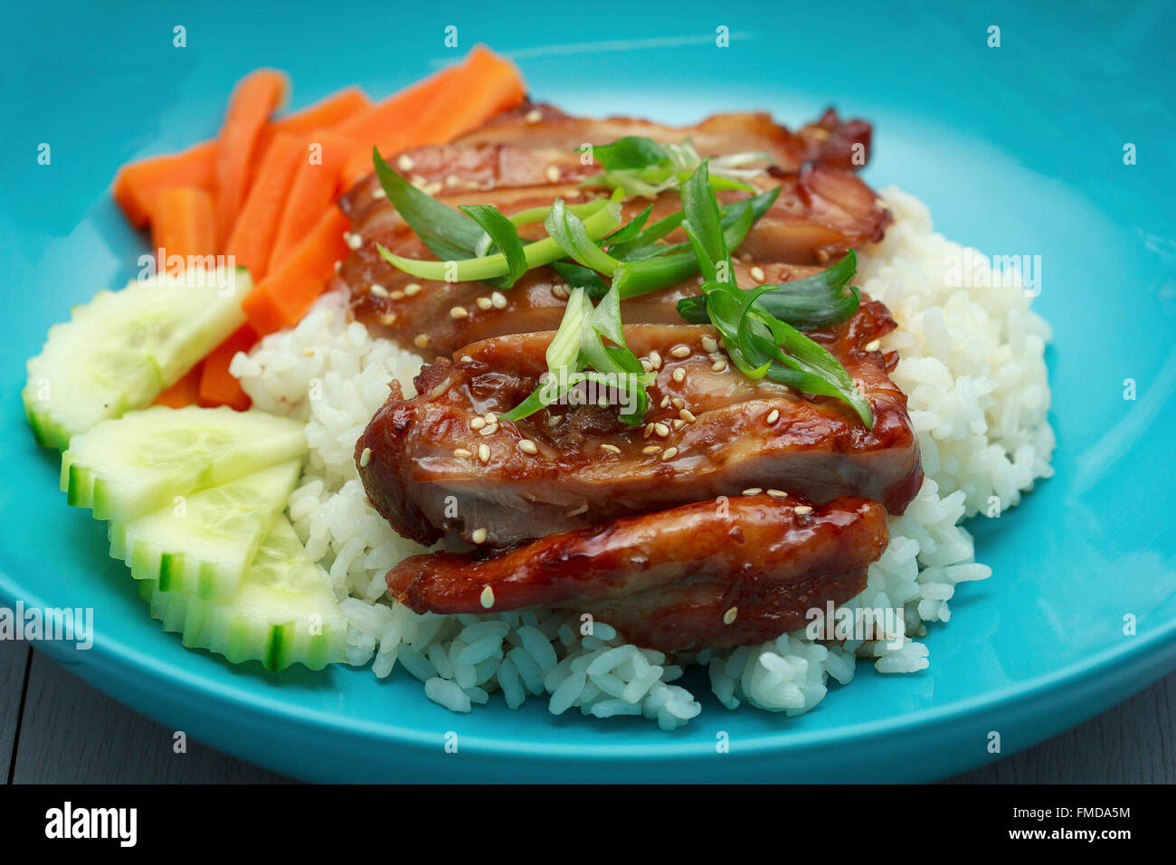 Honey soy chicken with rice Stock Photo