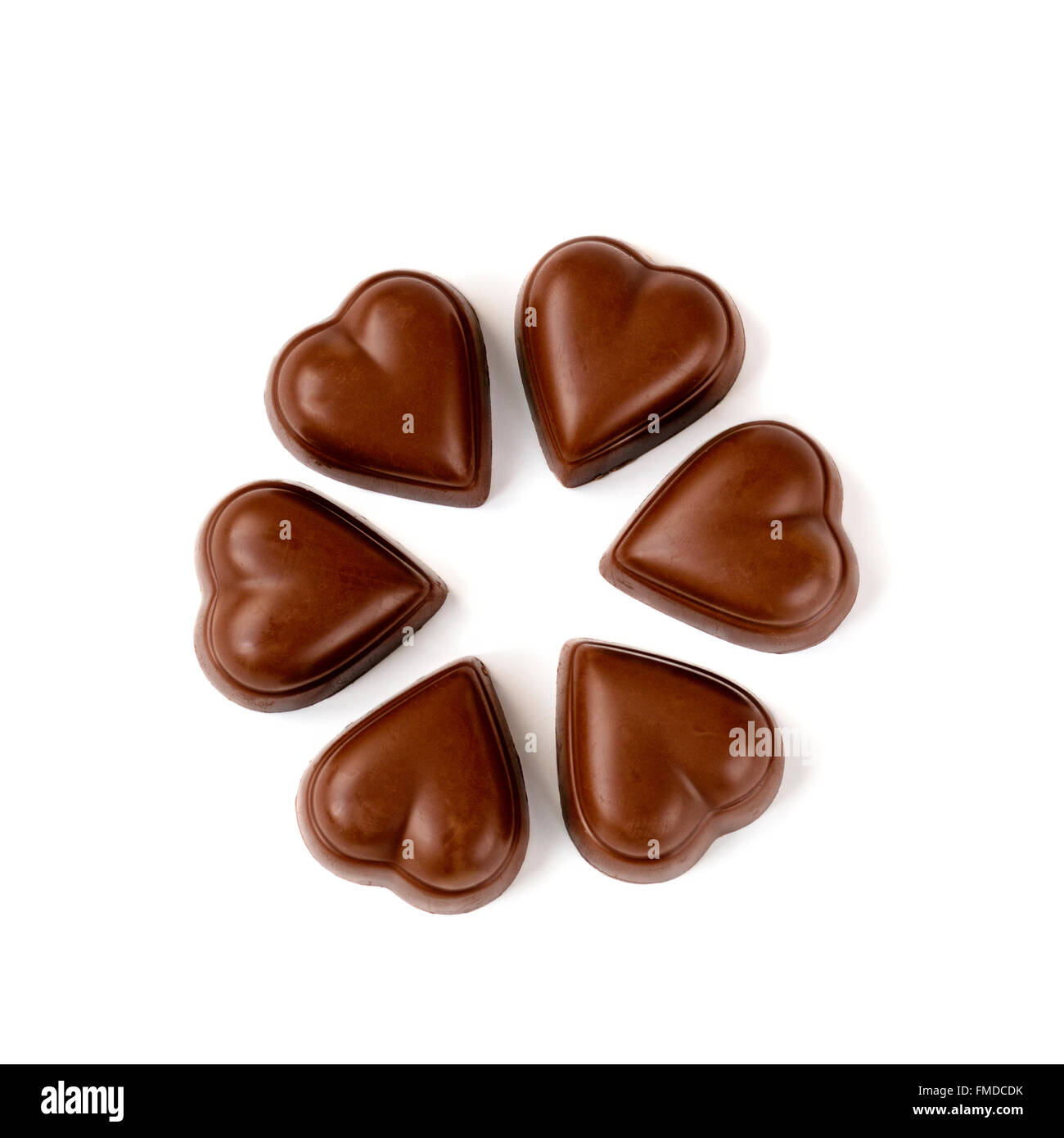 Milk chocolate heart shaped pralines arranged in circle Stock Photo Alamy
