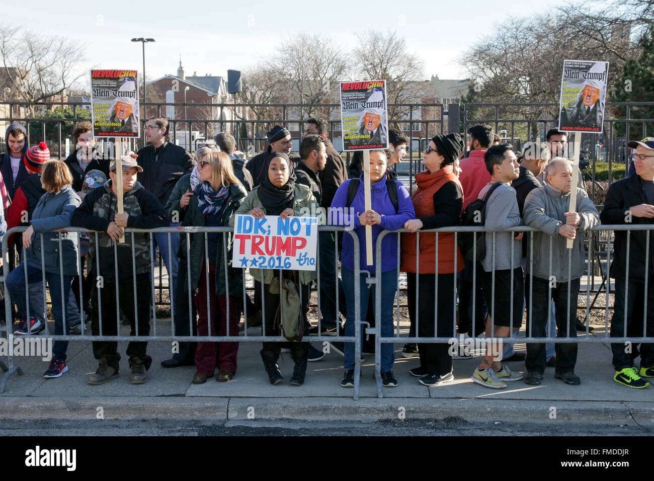 Chicago USA 11th March 2016. A few of the thousands of people protesting a Donald Trump campaign rally at the UIC Pavilion result in the postponement of the rally. While Mr. Trump claimed the rally was canceled upon the urging of the Chicago Police Department, it's since been revealed that Mr. Trump himself canceled the event. Credit:  Todd Bannor/Alamy Live News Stock Photo