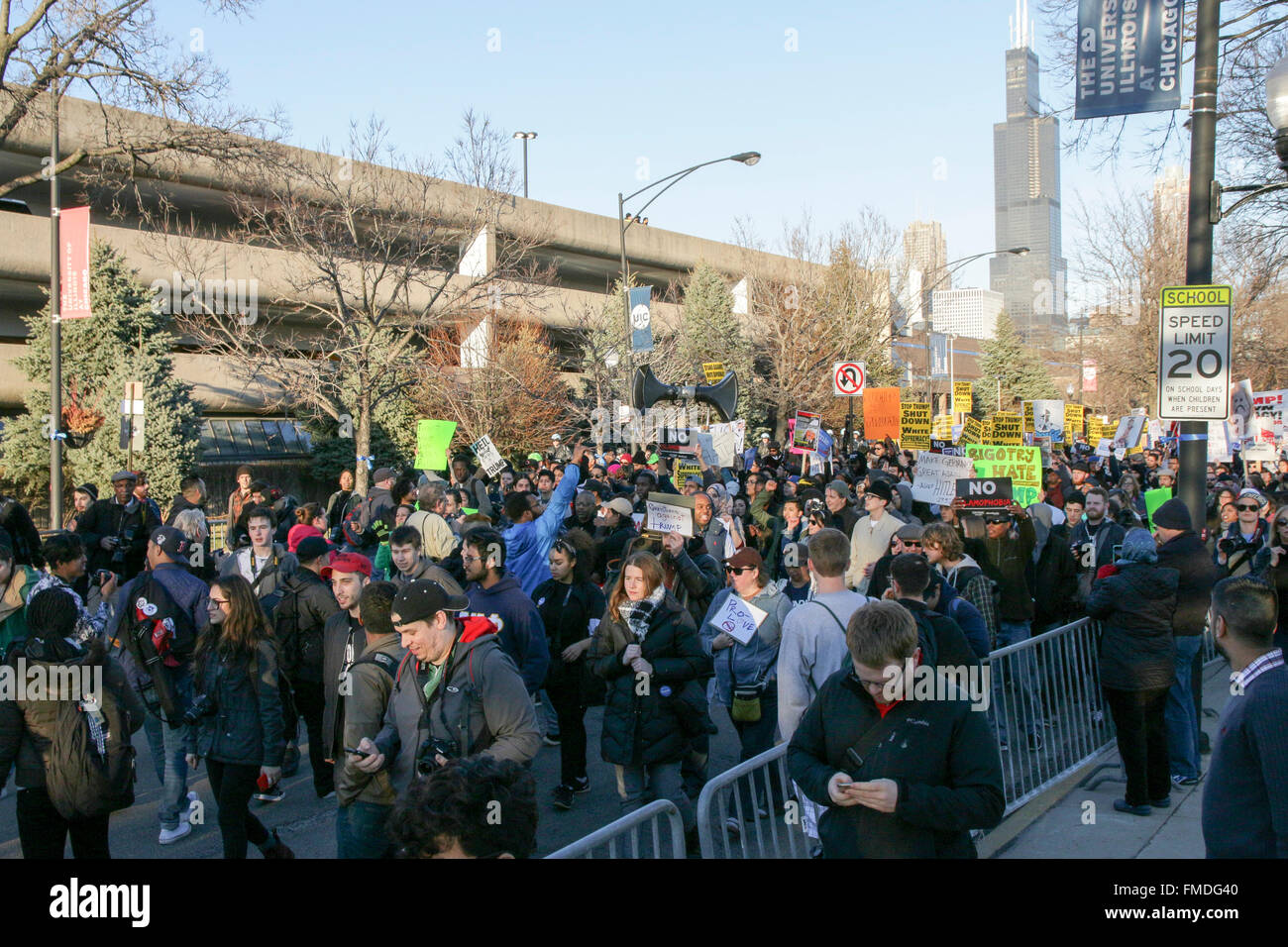 Chicago USA 11th March 2016. Thousands of people protesting a Donald Trump campaign rally  at the UIC Pavilion result in the postponement of the rally. While Mr. Trump claimed the rally was canceled upon the urging of the Chicago Police Department, it's since been revealed that Mr. Trump himself canceled the event. Credit:  Todd Bannor/Alamy Live News Stock Photo