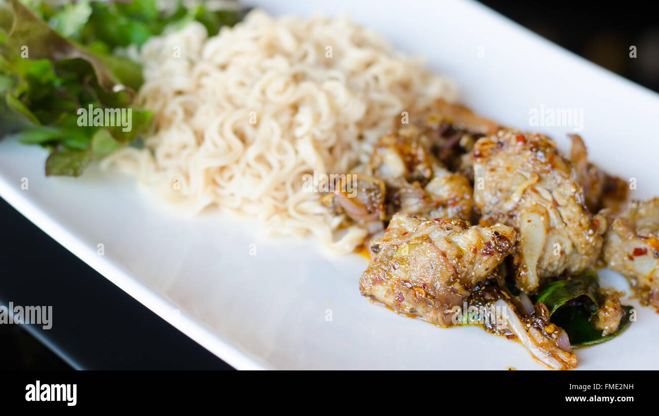 Fried Thai Mama Instant Noodles With Pork Stock Photo