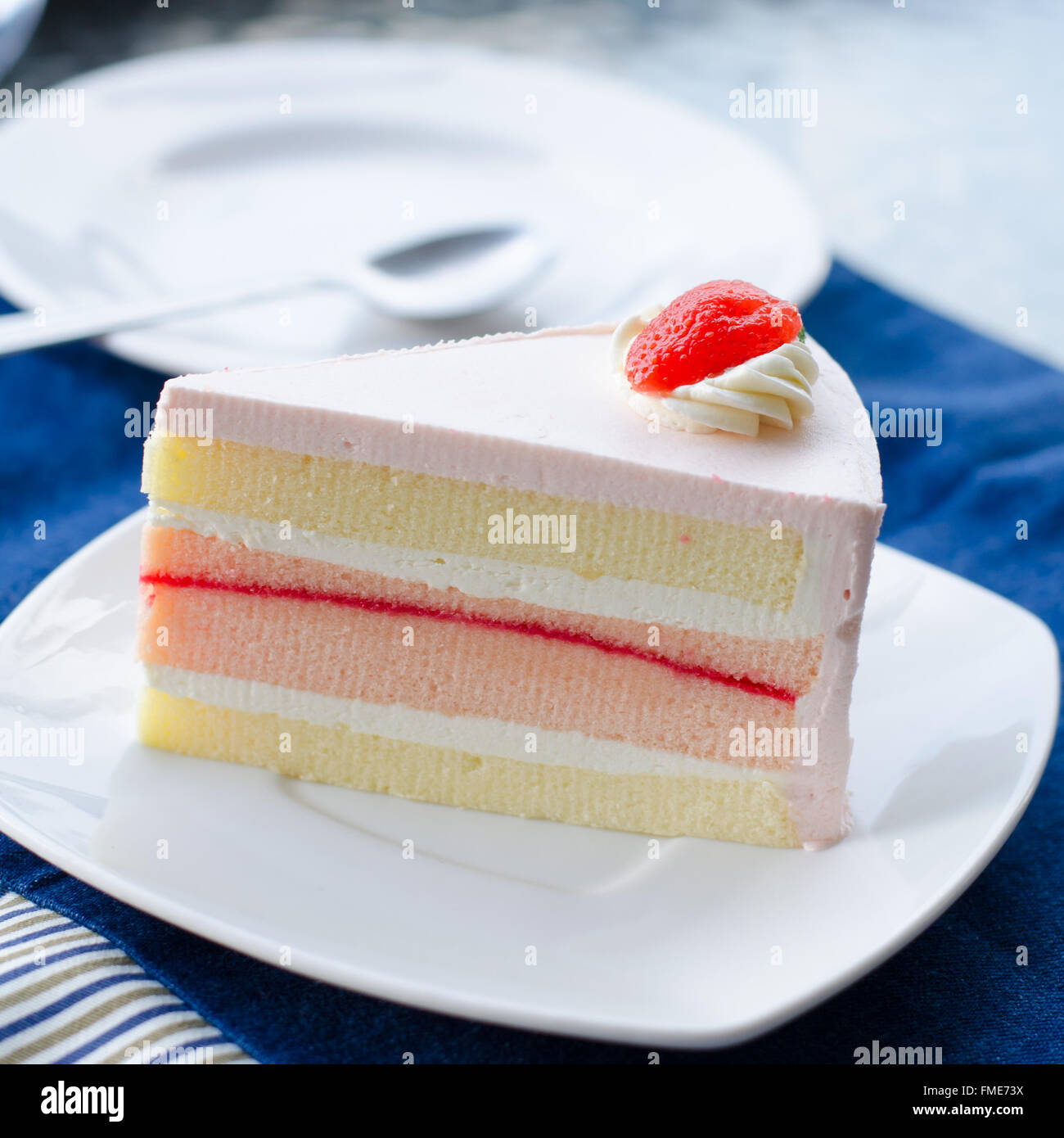 Strawberry cheesecake on white plate Stock Photo