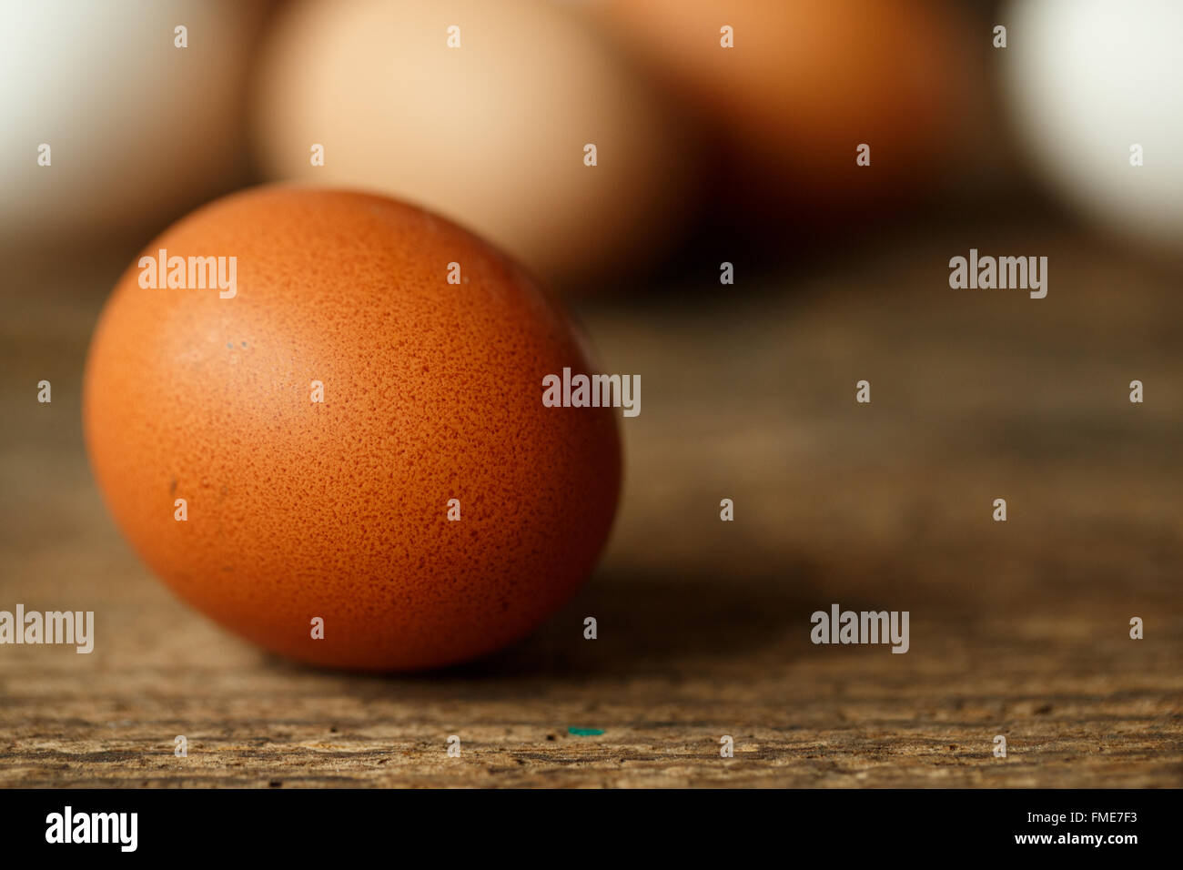 Fresh chicken eggs on a wooden rustic background Stock Photo - Alamy