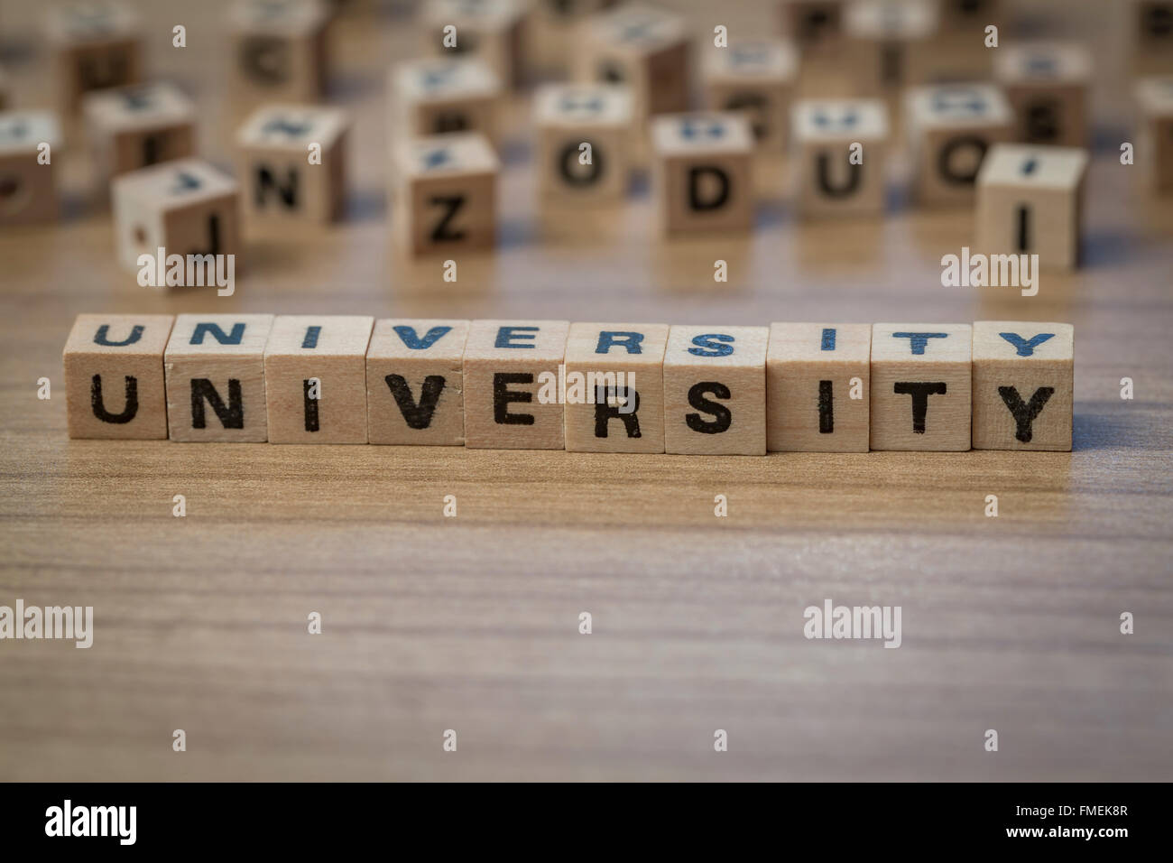 University written in wooden cubes on a table Stock Photo