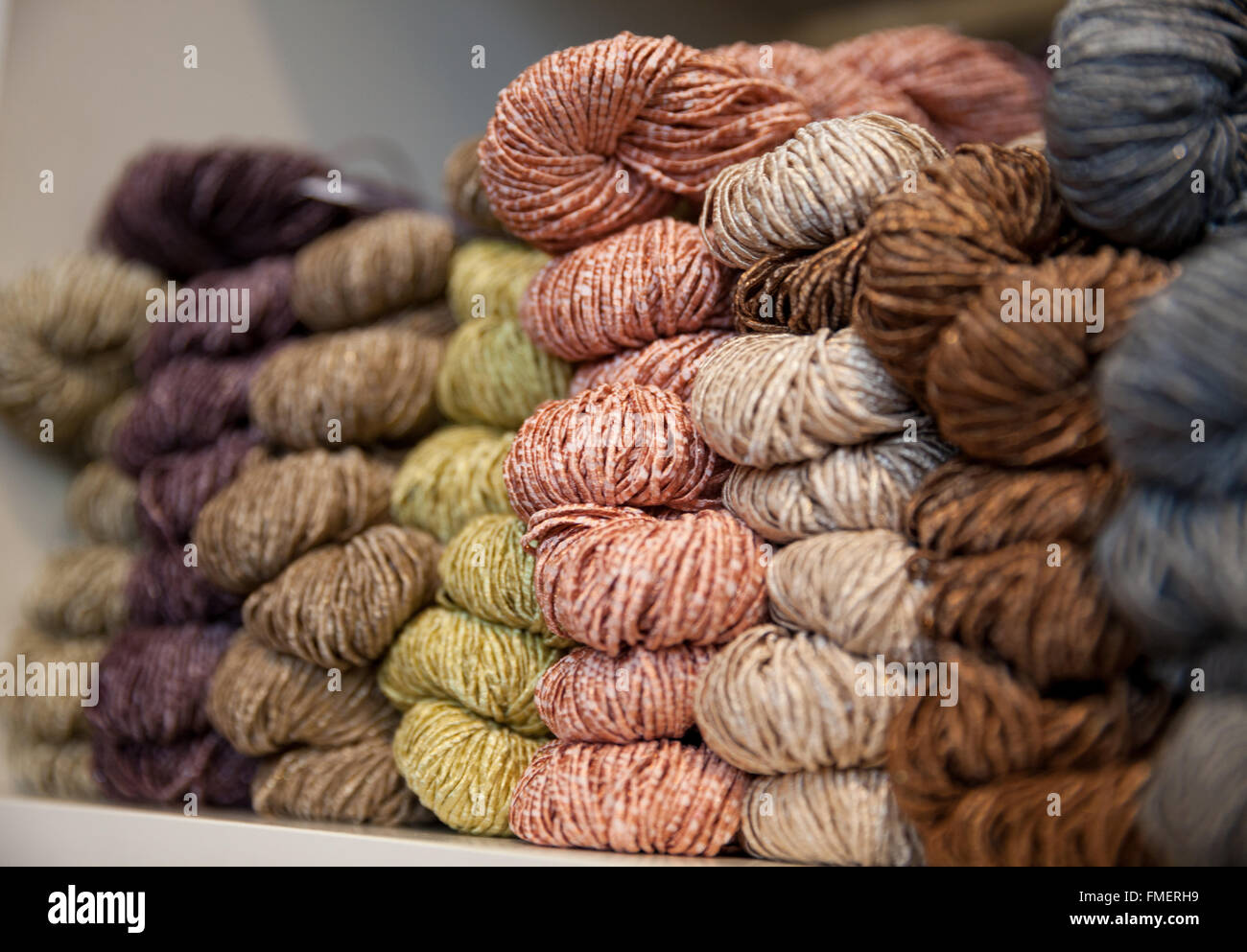 Colorful skeins of yarn on display. Stock Photo