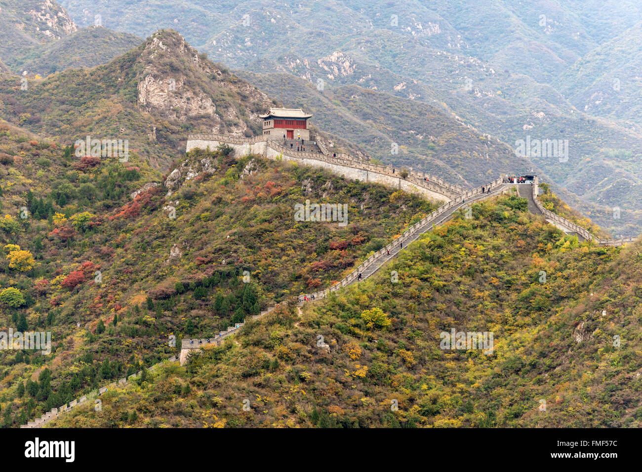 A lot of tourists (unrecognizable) visit the Great Wall of China and admiring the architectural 'miracle' Stock Photo