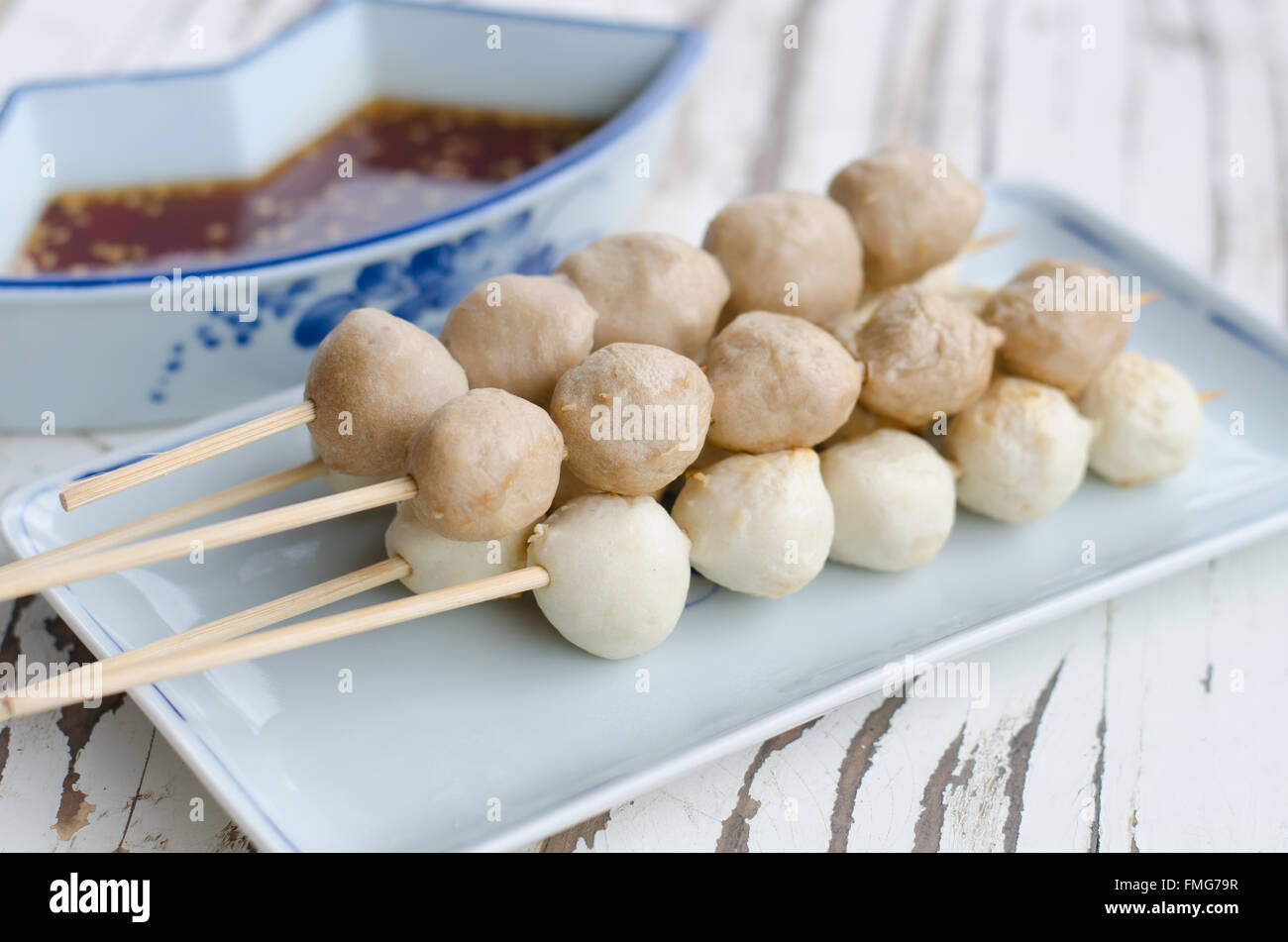 Roasted meat and pork balls with sweet spicy sauce Stock Photo