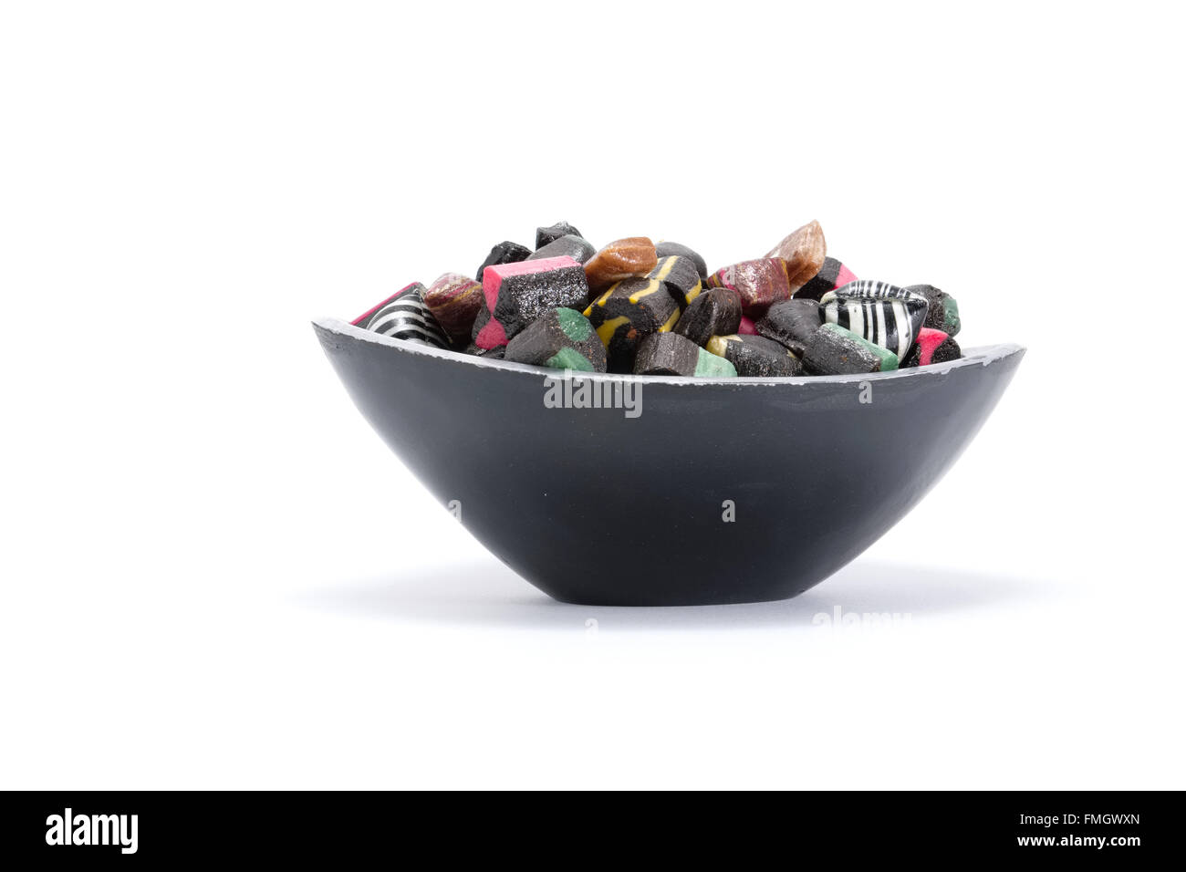 Candy bowl filled with candy seen from the side Stock Photo