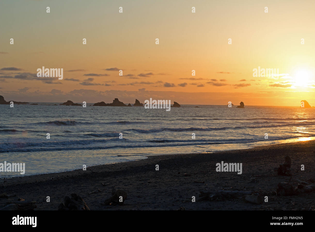 sunset on the beach Stock Photo - Alamy