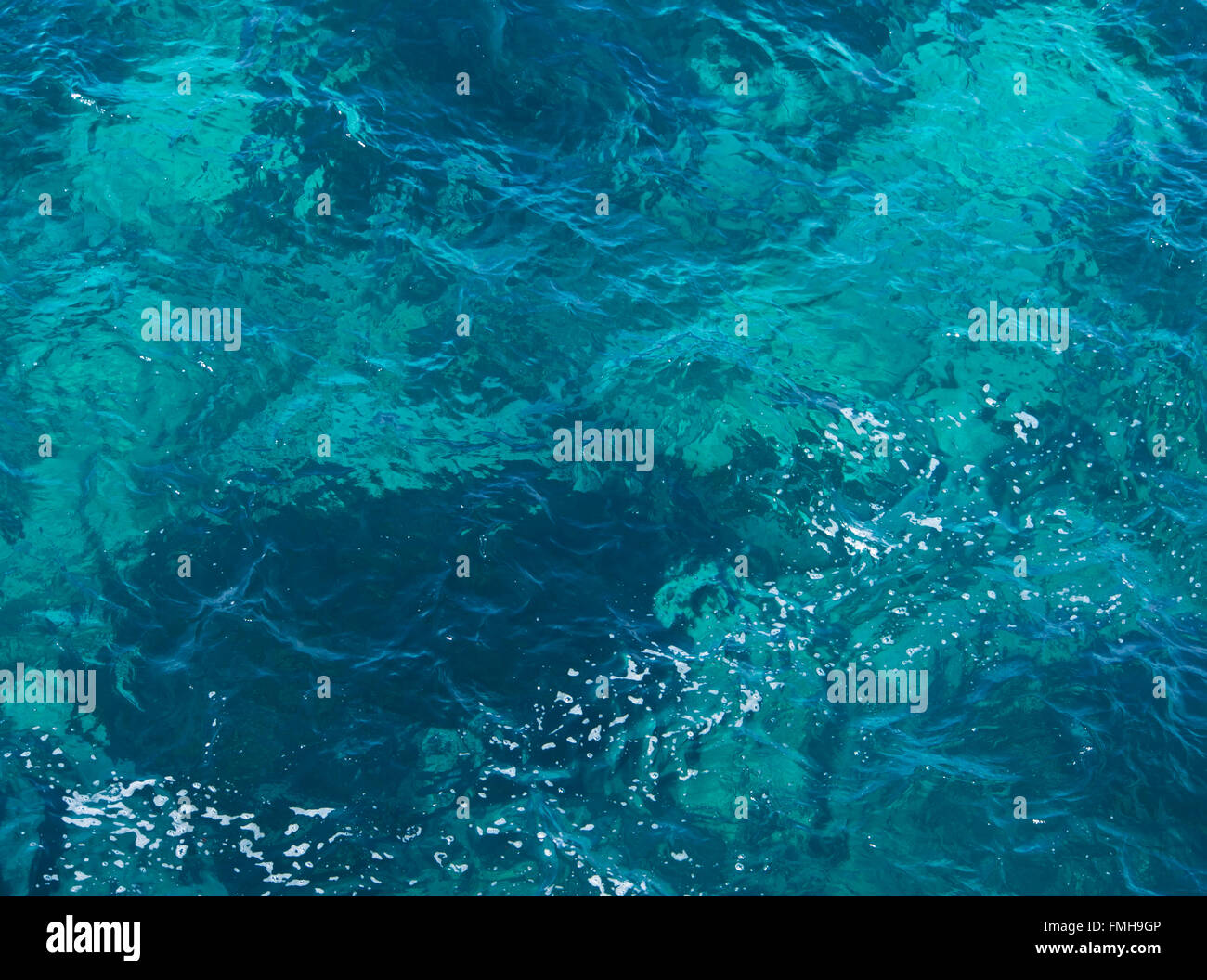 Shades of azure blue sea with ripples, right for a summer holiday mood Stock Photo