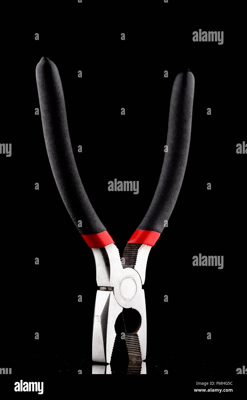 pliers red and black color to work Stock Photo