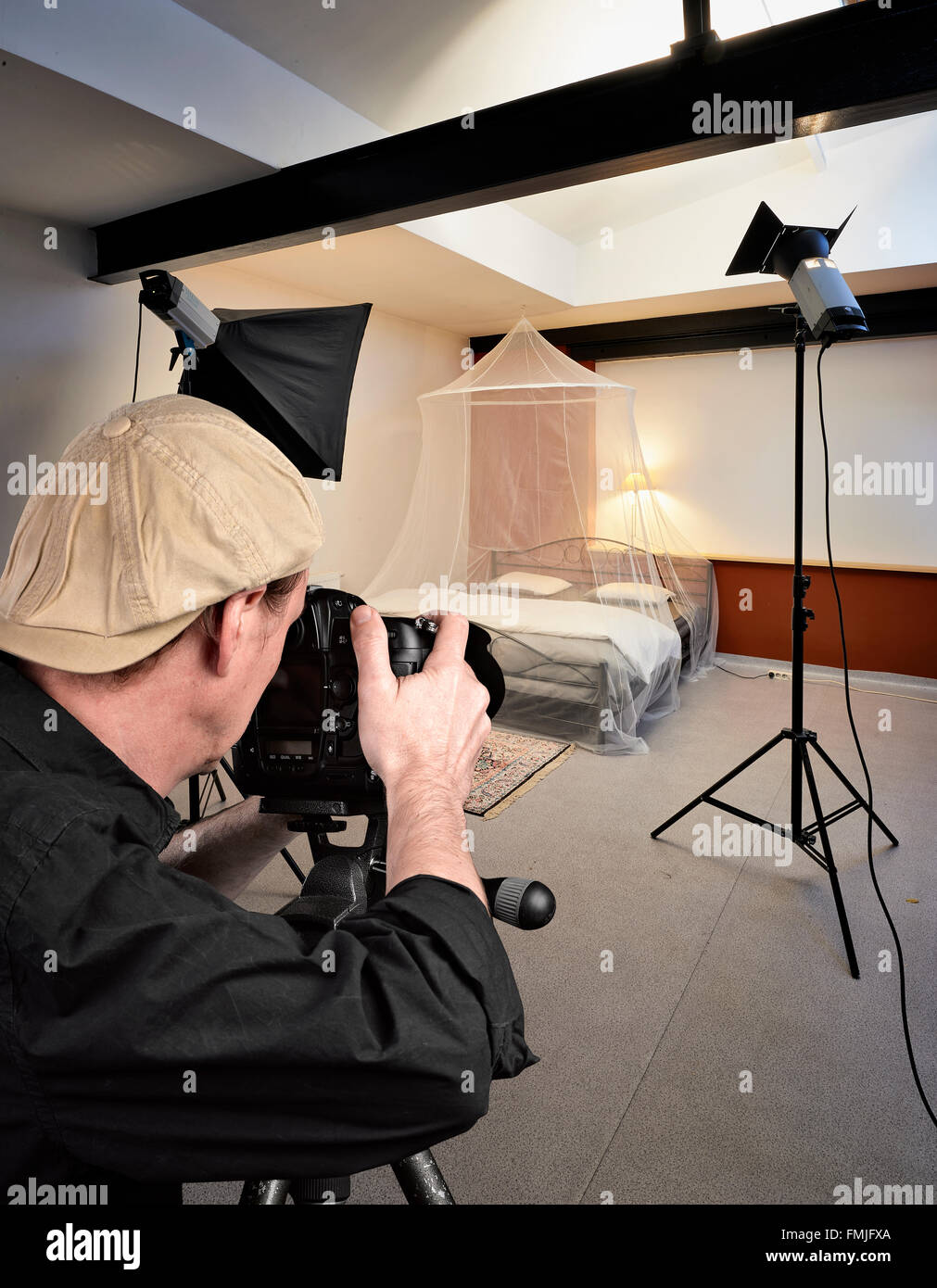 Photo studio with lighting equipment , ready to shoot bed Stock Photo