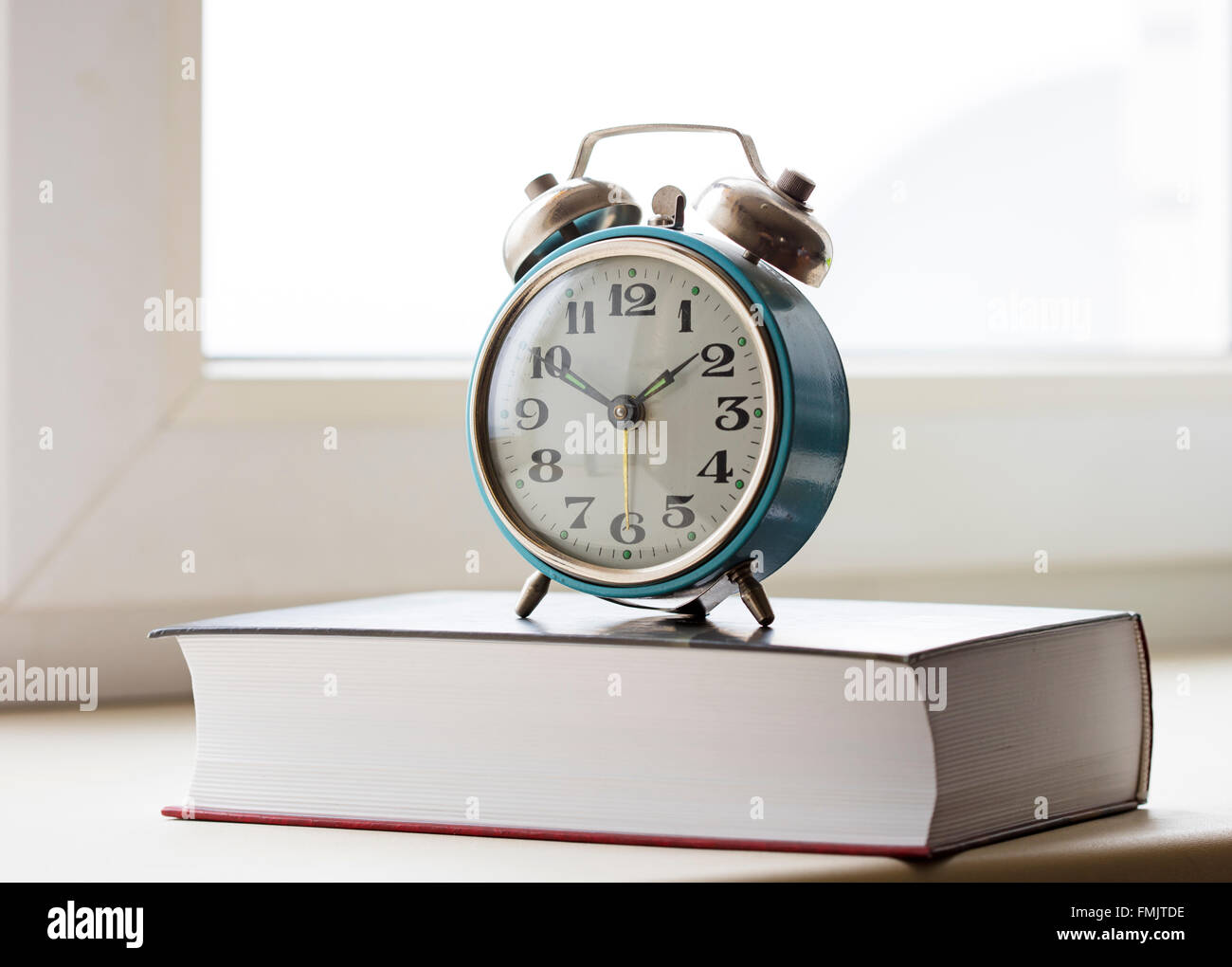 vintage mechanical alarm clock, old bracket clock Stock Photo Alamy