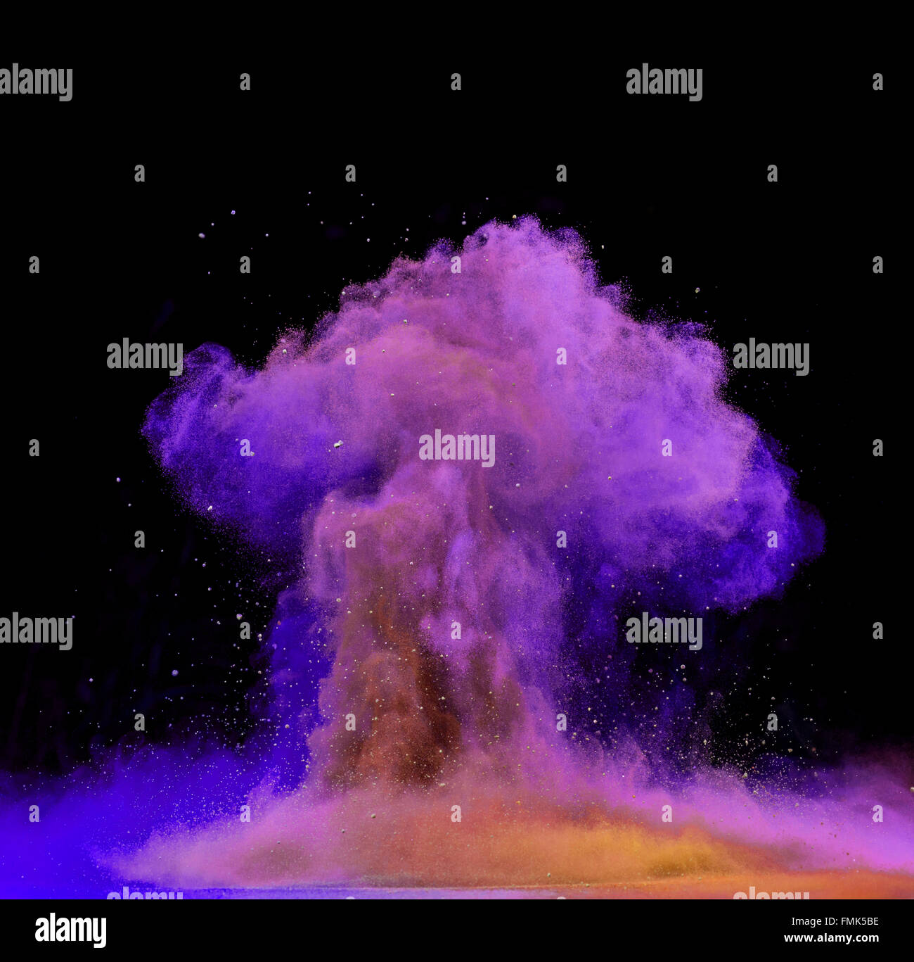 Explosion of colored powder on black background Stock Photo - Alamy