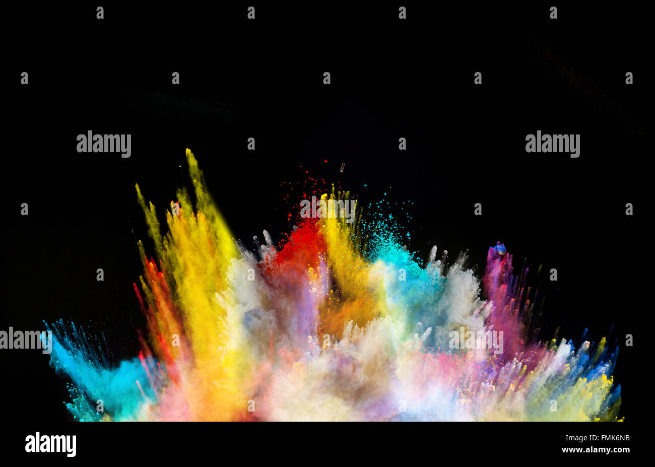 Explosion of colored powder on black background Stock Photo - Alamy