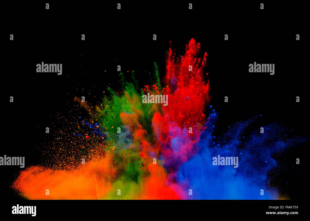 Explosion of colored powder on black background Stock Photo - Alamy