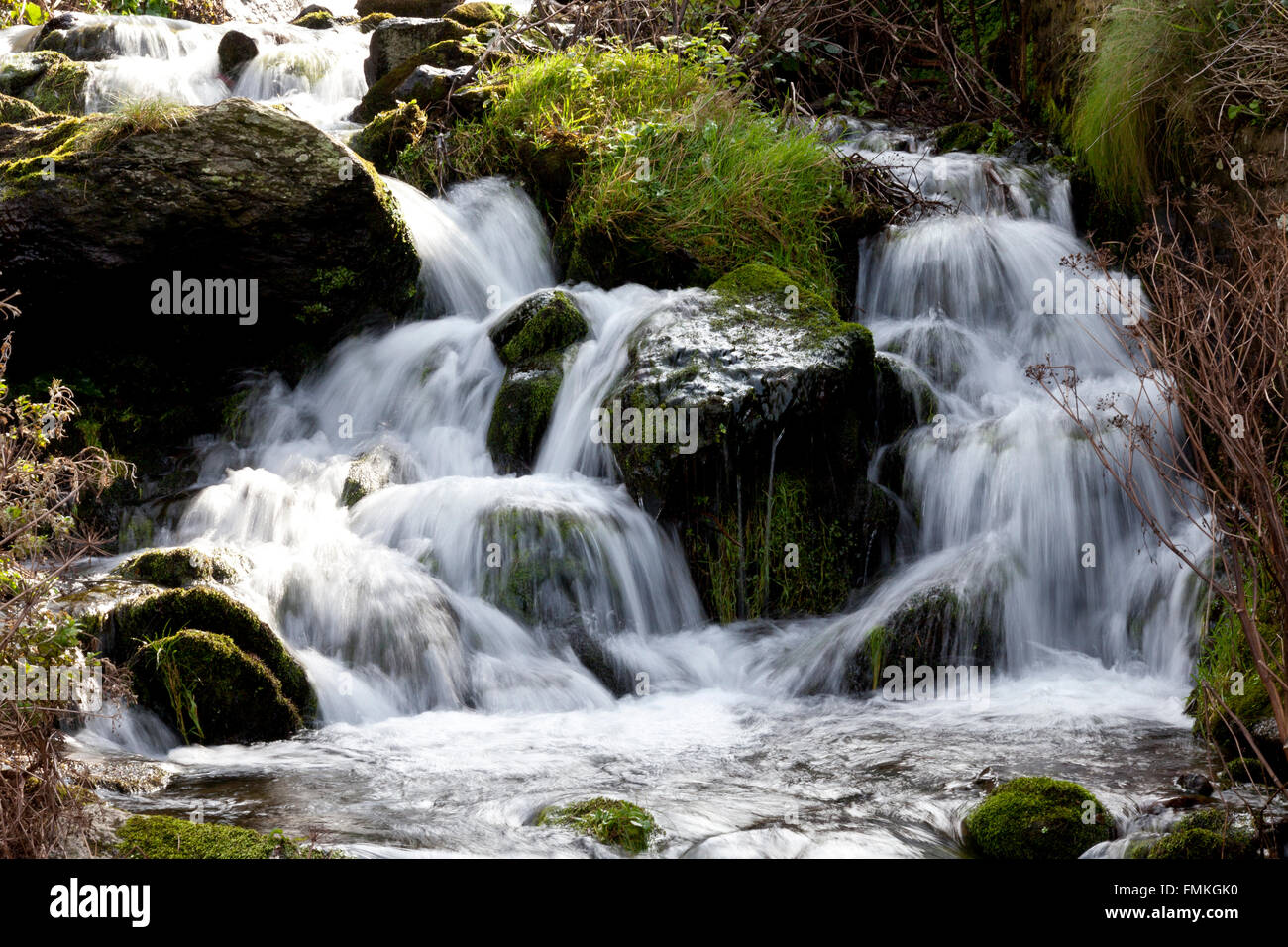 A stream from Exmoor tumbles over the waterfalls at Lee Bay and empties ...