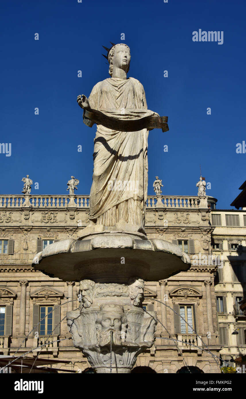 Ancient Fountain of Madonna Verona, in the center of Piazza delle Erbe square Stock Photo
