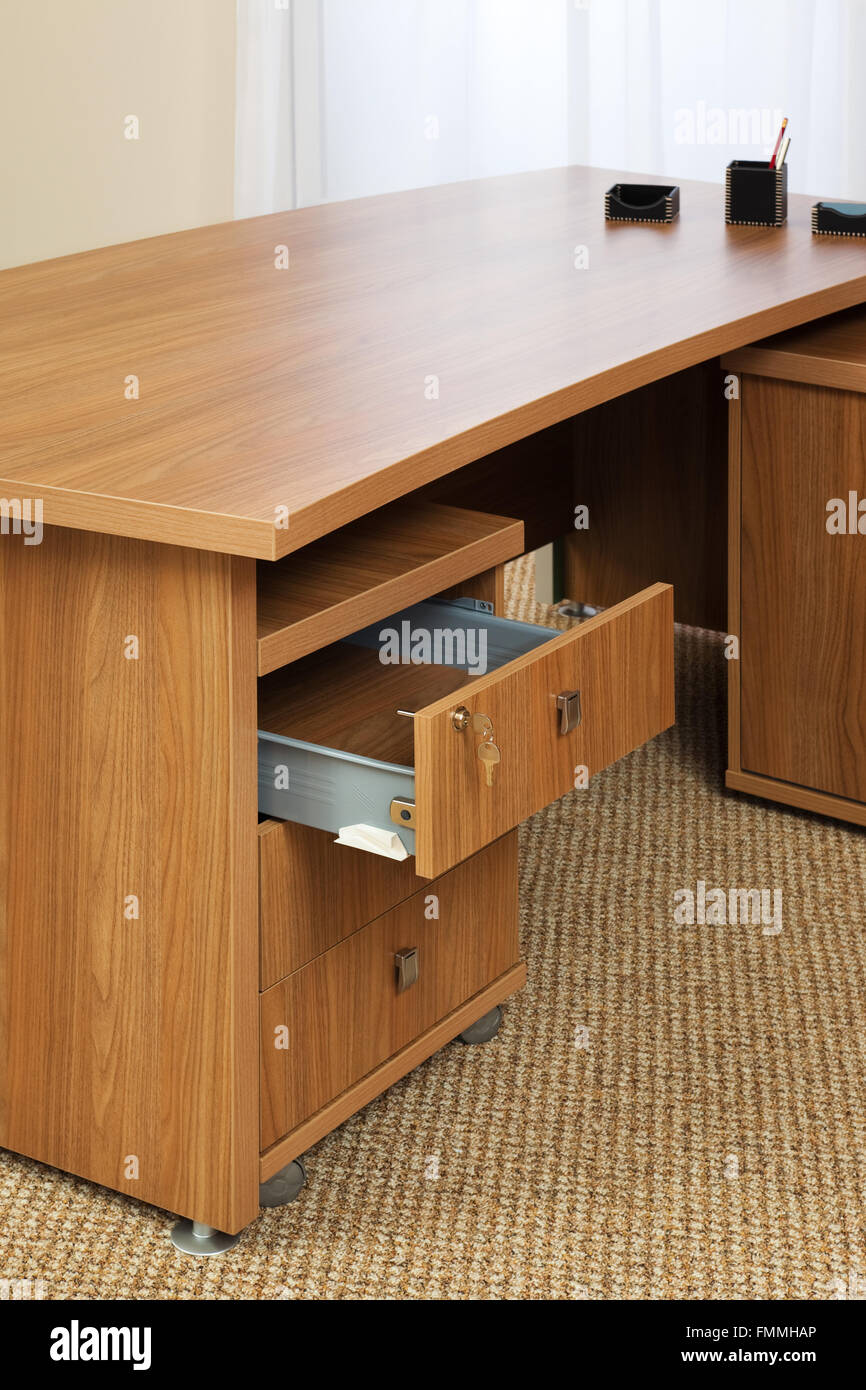 wooden table with an open box in the office Stock Photo - Alamy